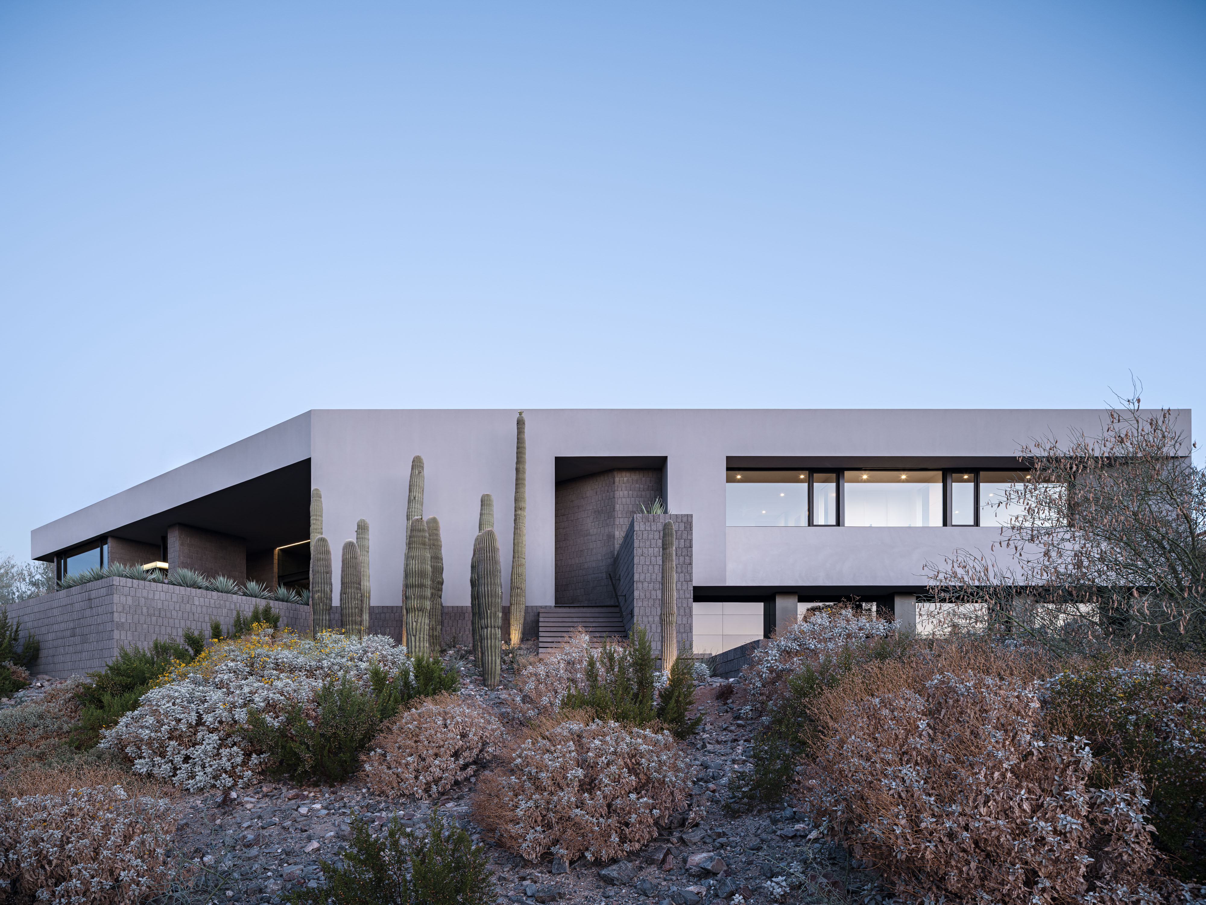 Arizona home Shifted Horizon by A-I-R, block built minimalist home, textured and monolithic looking in desert environment