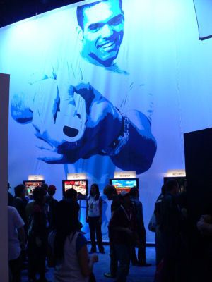 The poster shows a guy having fun with the innovative new Wii controller.