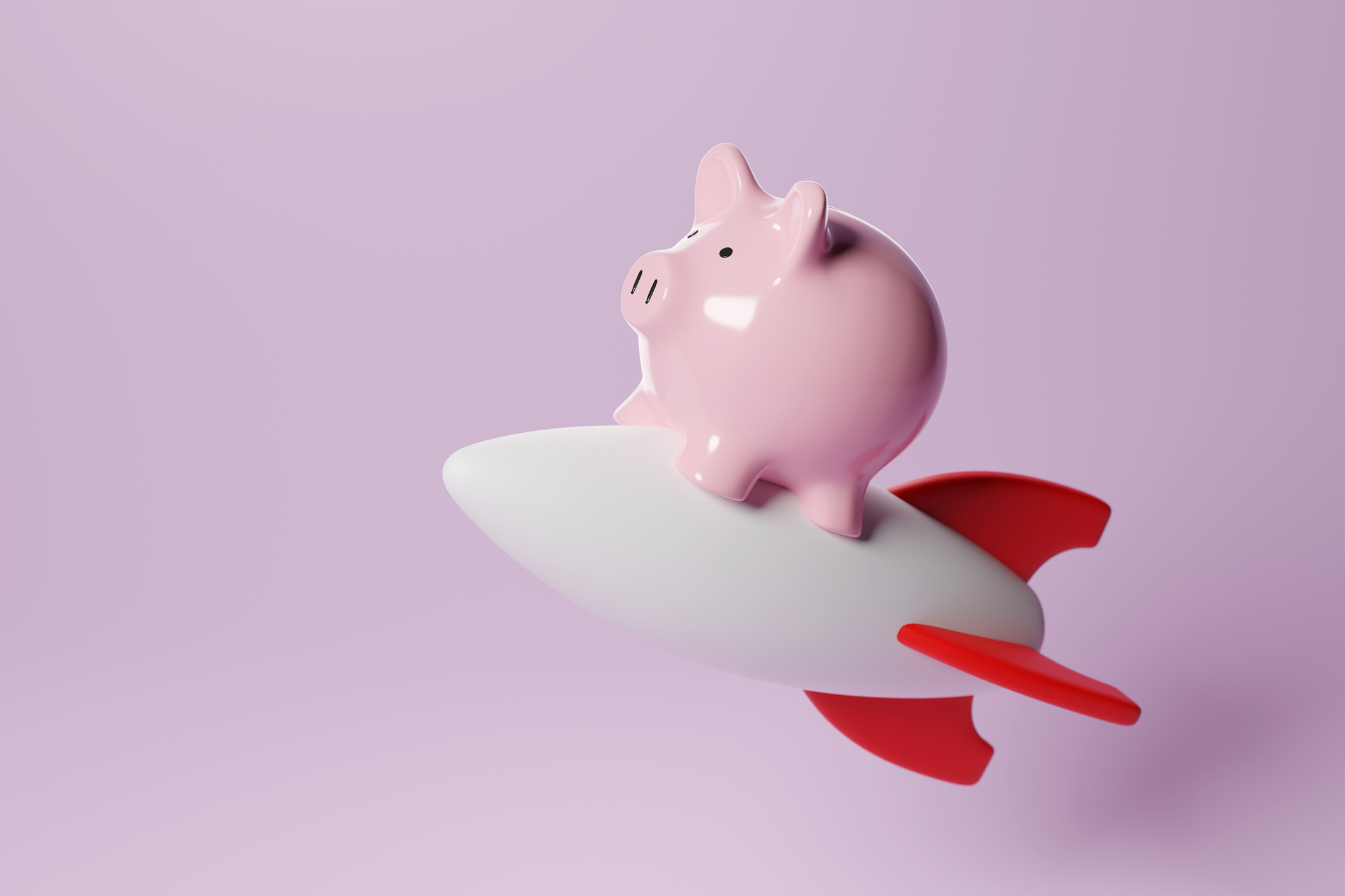 a piggy bank on a rocket signifying an upwards trajectory