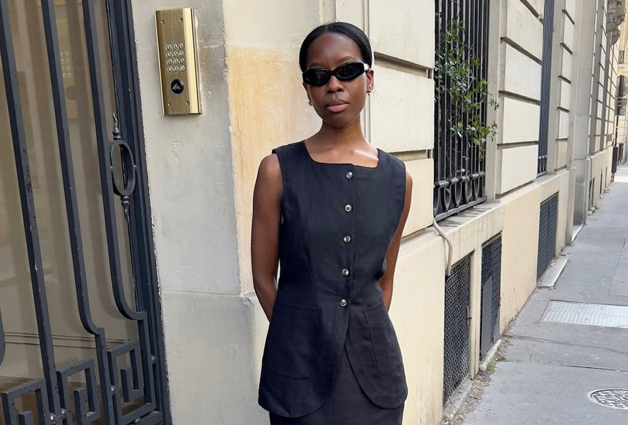 Sylvie Mus wearing a black linen Posse vest and skirt set.