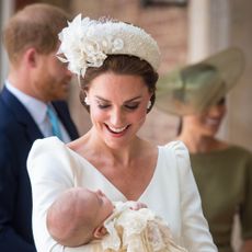 Princess Kate holding Prince Louis on his christening day