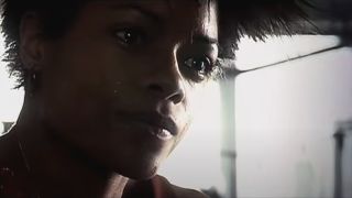 Naomie Harris crying in a hospital room in 28 Days Later.