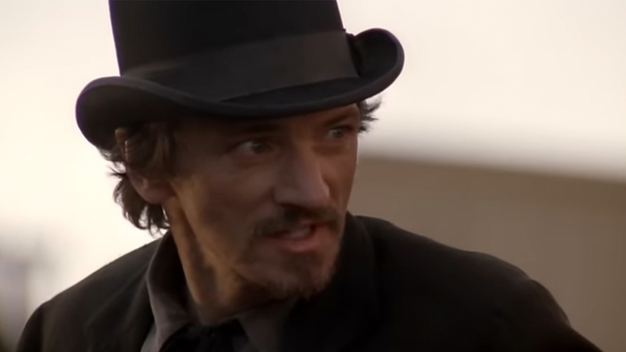 John Hawkes wearing a bowler hat on Deadwood