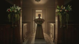 Polly Hillinghead walks down the aisle in Bodies episode 8 on Netflix.