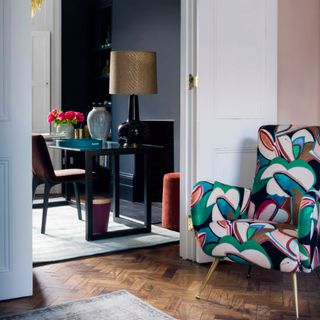 upholstered chairs with wooden flooring