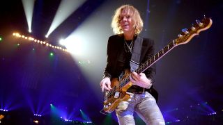 Bassist Tom Hamilton of Aerosmith performs onstage during the 2012 iHeartRadio Music Festival at the MGM Grand Garden Arena on September 22, 2012 in Las Vegas, Nevada.