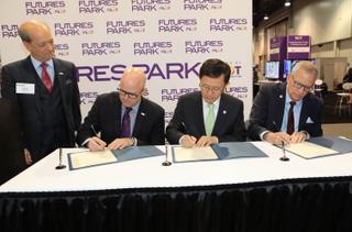 (L to R)Skip Pizzi, NAB VP, technology education and outreach looks on as Sam Matheny, NAB EVP and CTO; Jong-ki Chung, Korean Radio Promotion Association (RAPA) VP and CEO; and John Lawson, executive director of the AWARN Alliance add their names to a document promoting ATSC 3.0 collaboration across the three bodies, with special emphasis on the standard’s emergency alerting capabilities. Photo credit: NAB   