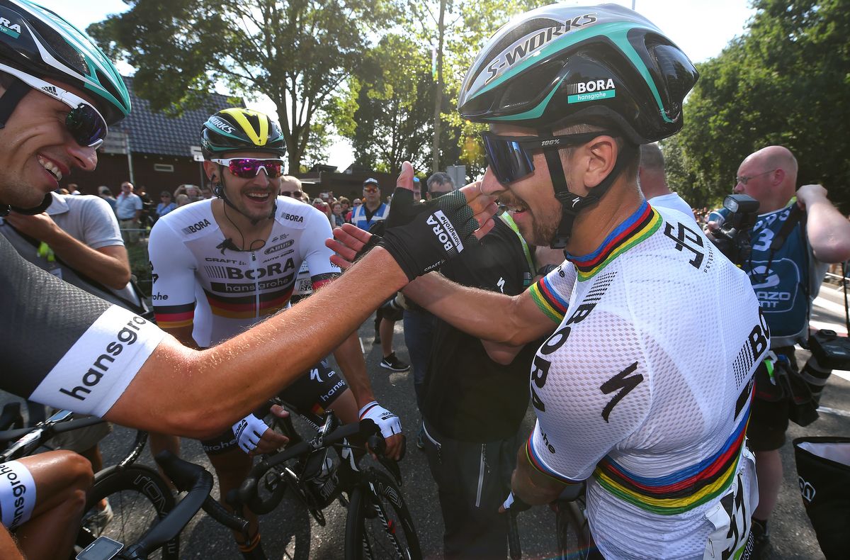 Peter Sagan celebrates once the win is made official