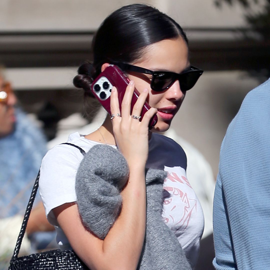 Olivia Rodrigo was spotted in NYC wearing a pleated plaid maxi skirt and Mary Janes