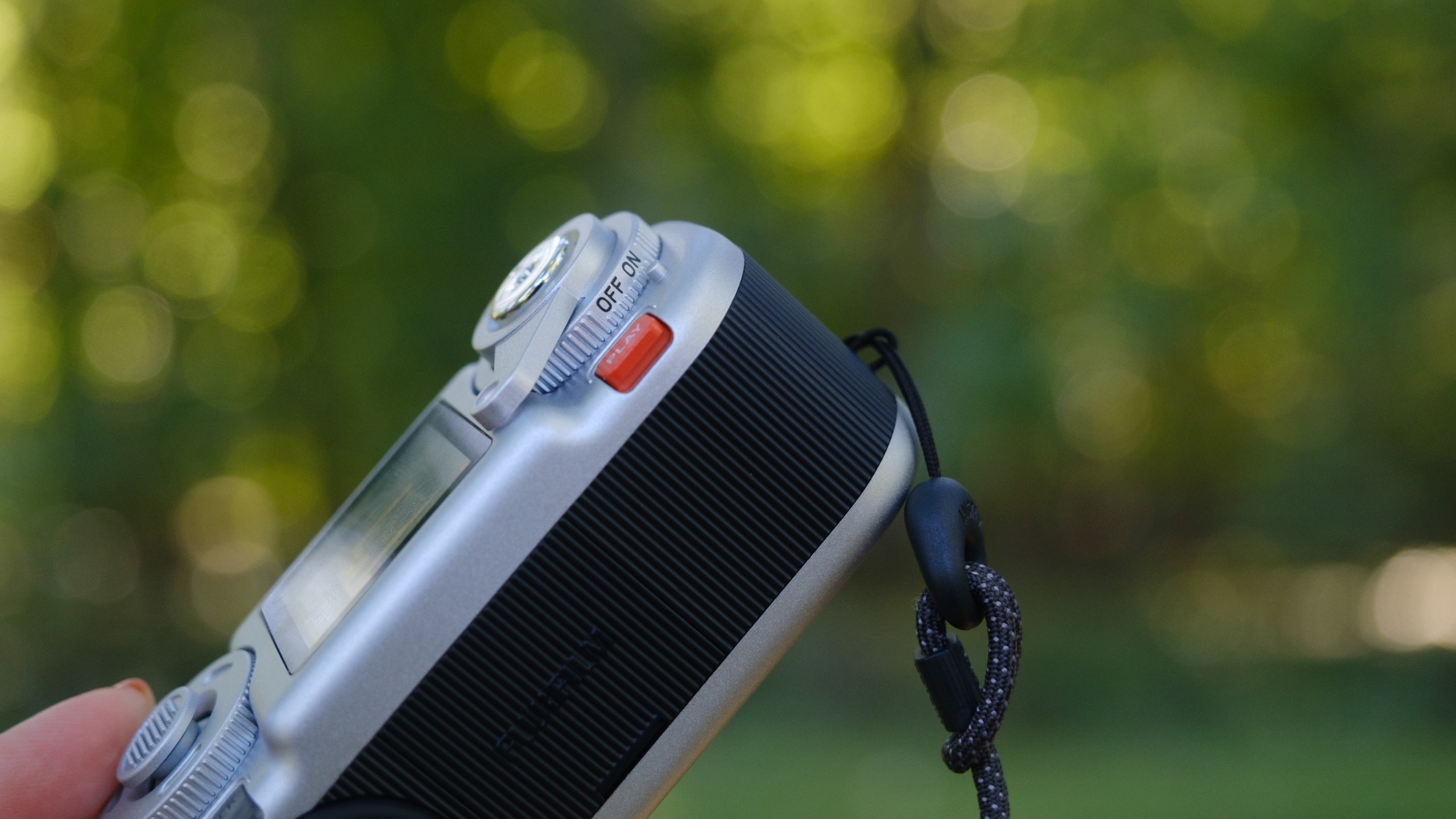 The Instax Pal 2 in a photographer's hands