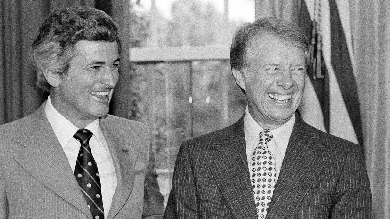 Jacob Butcher and Jimmy Carter © Barry Thumma/AP/Shutterstock