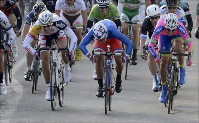 A drag race to the finish line in the closing meters between Jens Debusschere (Lotto Belisol), Nacer Bouhanni (FDJ) and Alessandro Petacchi (Lampre-Merida)