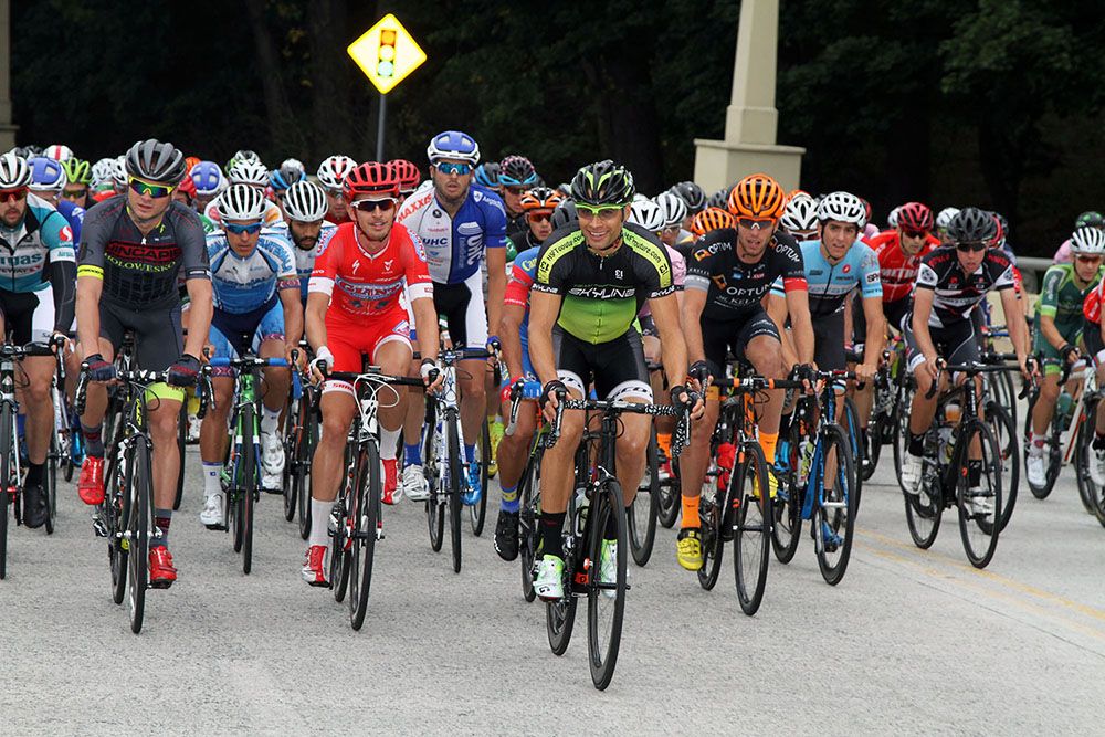 With a big smile, local rider Ryan Dewald (Skyline) leads the field brought his hometown.