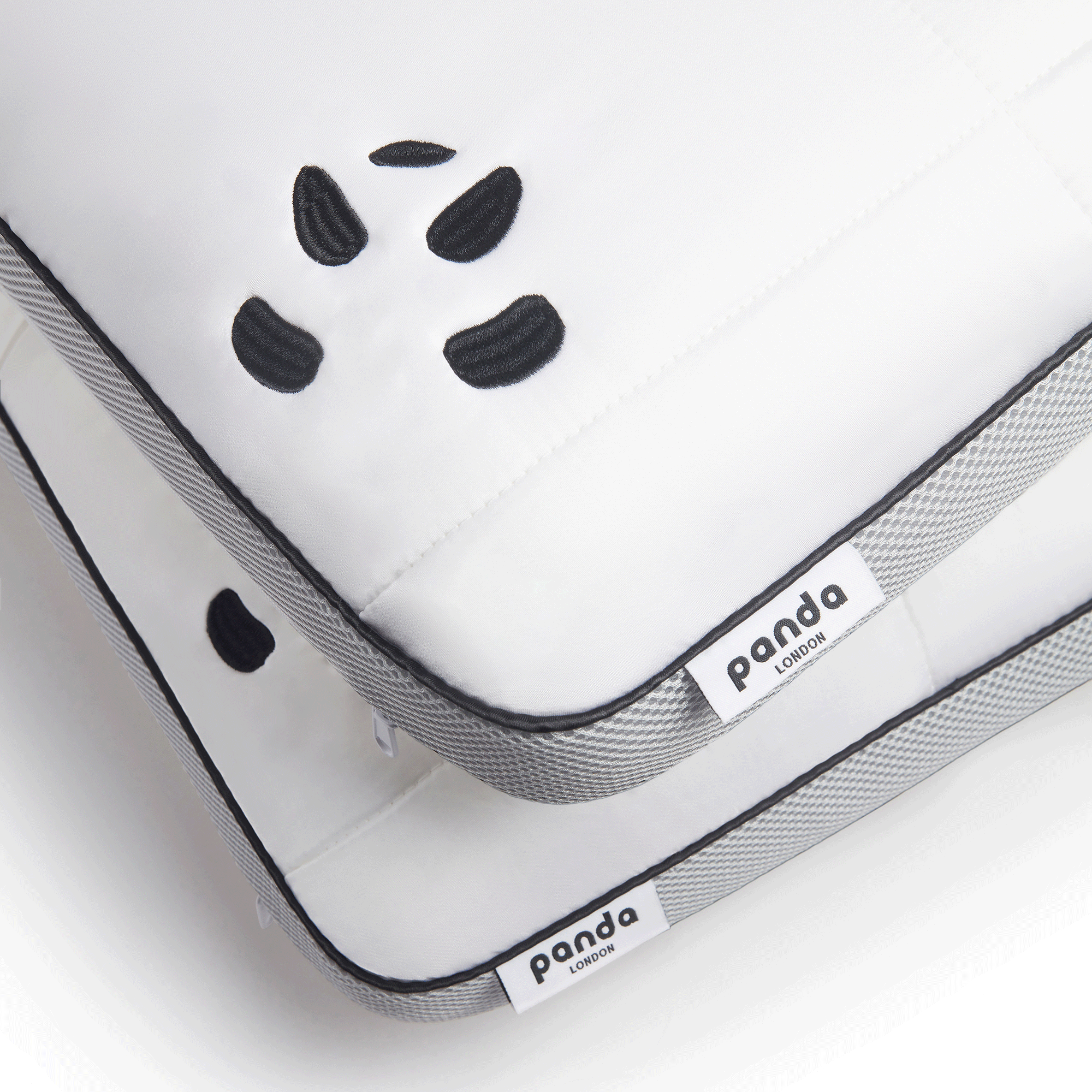 White pillow with panda logo