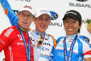 Peter McDonald (Drapac Porsche Cycling), Dan Martin (Garmin-Transitions) and Yusuke Hatanaka (Shimano Racing) on the podium.