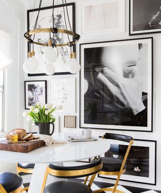 black and white kitchen with artwork