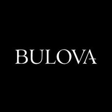 Woman wearing Bulova watch and holding man's arm