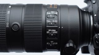 Image shows lens switches on the Nikkor AF-S FX 70-200mm f/2.8 FL-ED VR