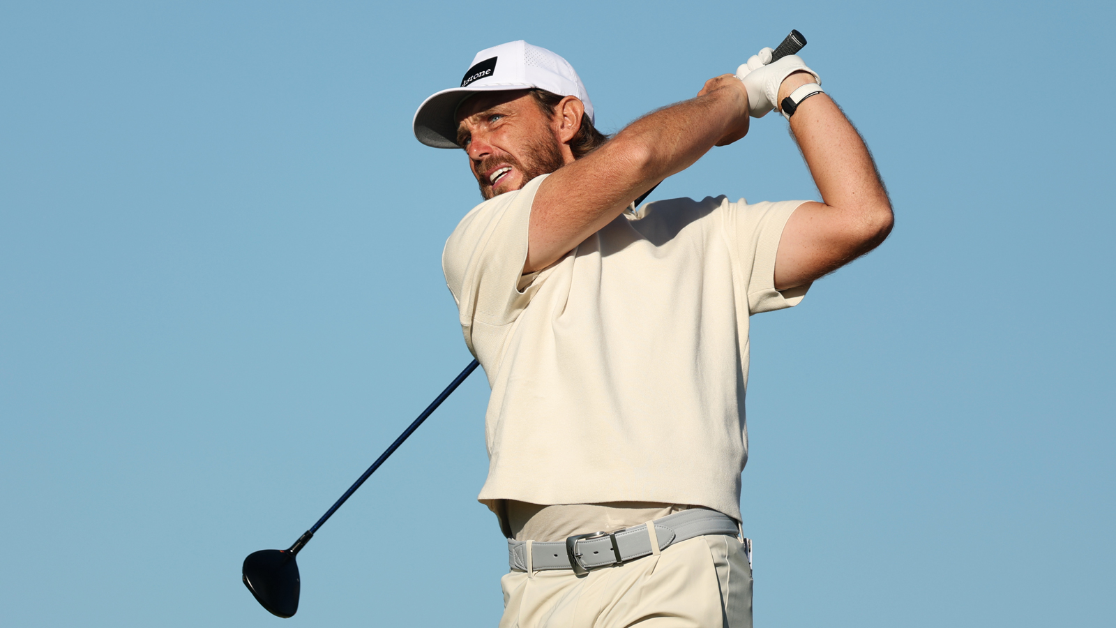 Tommy Fleetwood hits a mini driver
