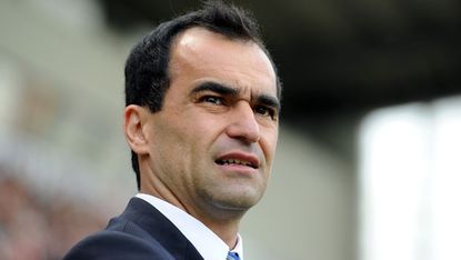 WIGAN, ENGLAND - MAY 13:Wigan Athletic manager Roberto Martinez looks on during the Barclays Premier League match between Wigan Athletic and Wolverhampton Wanderers at DW Stadium on May 13, 2