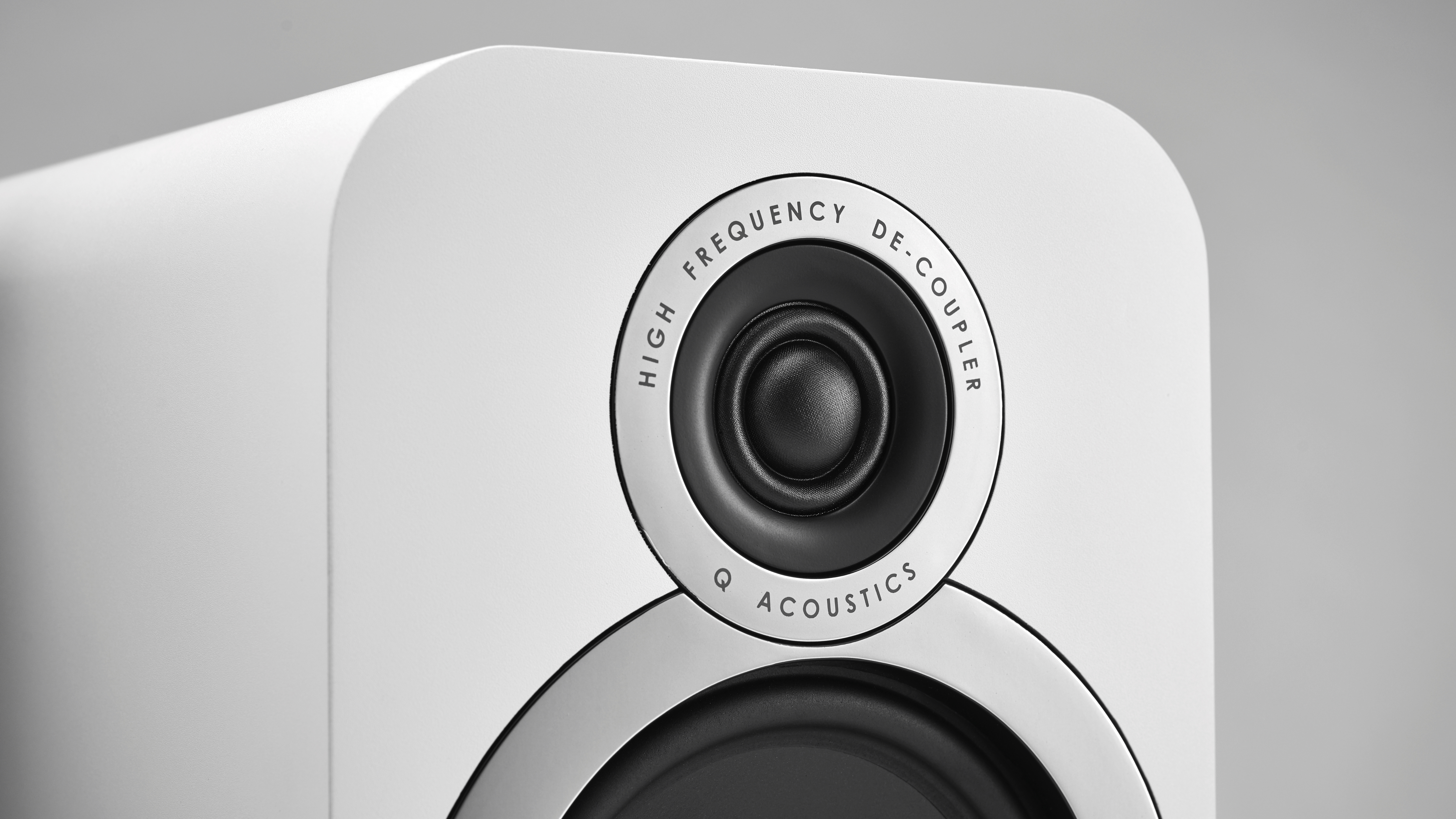 A close-up of the tweeter on a pair of Q Acoustic speakers