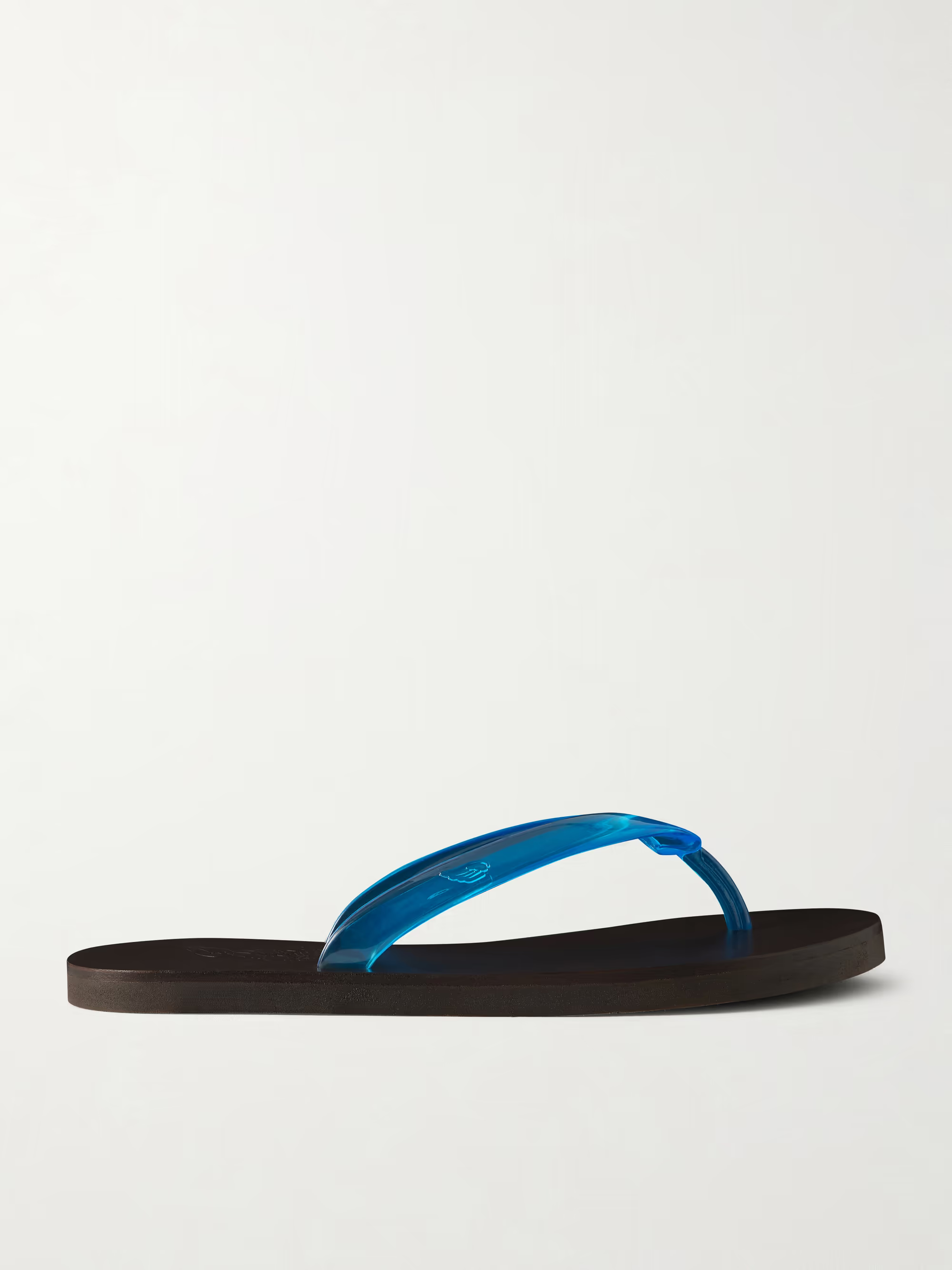 A pair of Ancient Greek Sandals jelly flip flops.