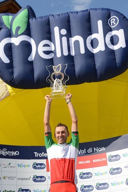 Ivan Santaromita (BMC) hoists his trophy high