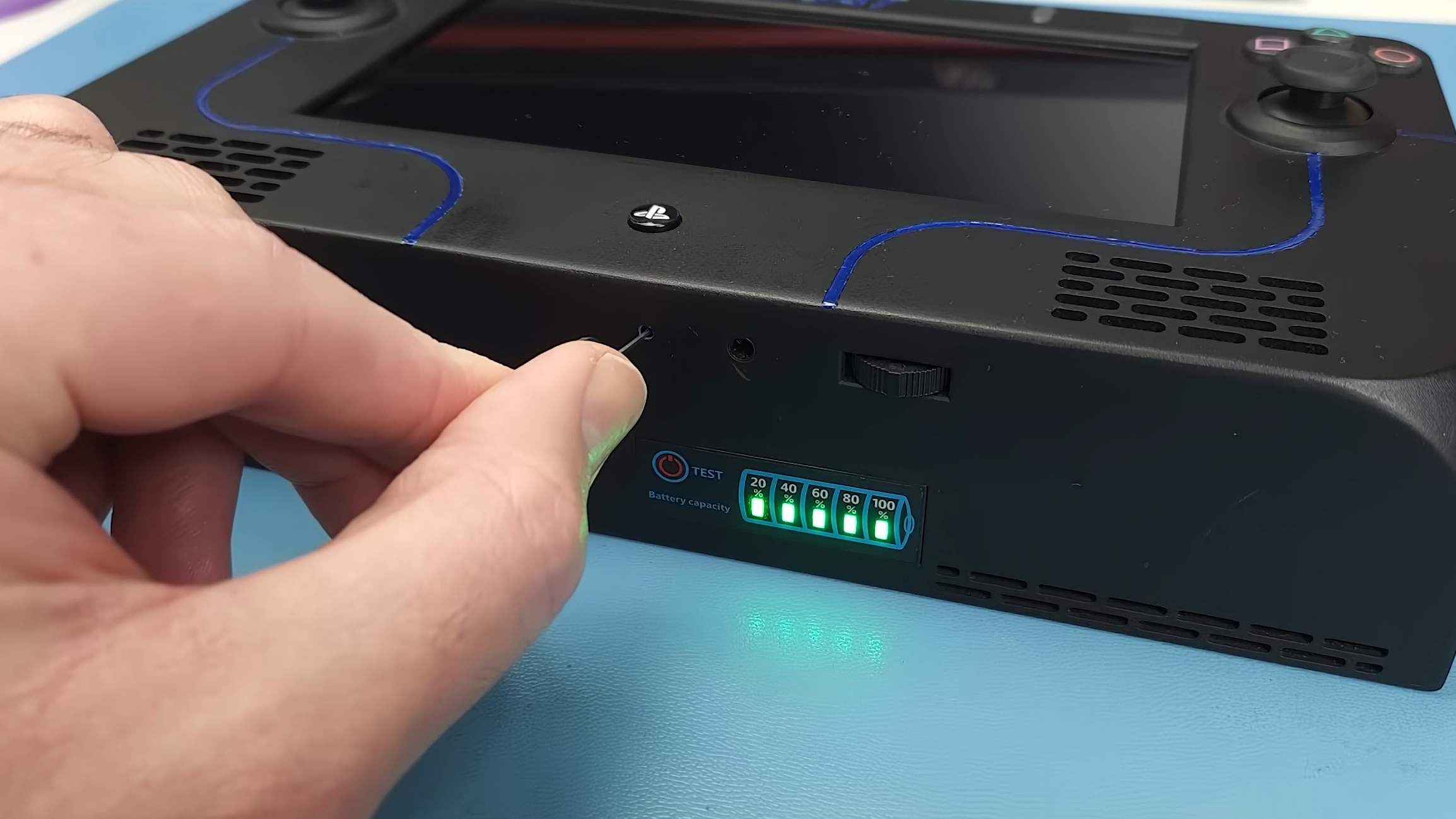 YouTuber Restore Technique's "PS4T" Handheld PlayStation 4 Slim Mod