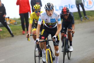 SAINTLARYSOULAN COL DU PORTET FRANCE JULY 14 Richard Carapaz of Ecuador and Team INEOS Grenadiers Tadej Pogaar of Slovenia and UAETeam Emirates Yellow Leader Jersey Jonas Vingegaard of Denmark and Team JumboVisma White Best Young Rider Jersey in the Breakaway at Col du Portet 2215m during the 108th Tour de France 2021 Stage 17 a 1784km stage from Muret to SaintLarySoulan Col du Portet 2215m LeTour TDF2021 on July 14 2021 in SaintLarySoulan Col du Portet France Photo by Tim de WaeleGetty Images