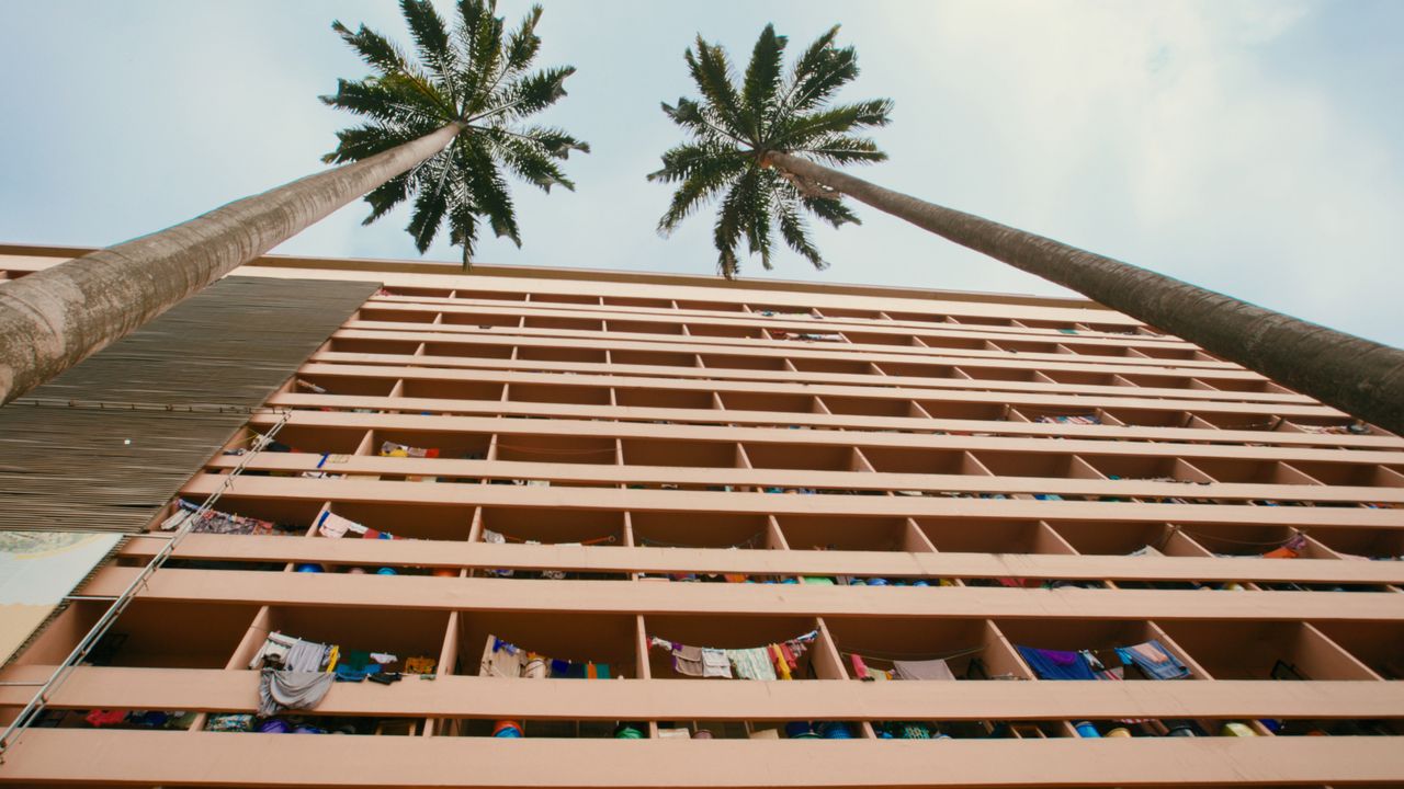 Film still of Unity Hall, KNUST, Kumasi by John Owuso Addo and Miro Marasović at the V&amp;A&#039;s &#039;Tropical Modernism: Architecture and Independence&#039; exhibitionA 