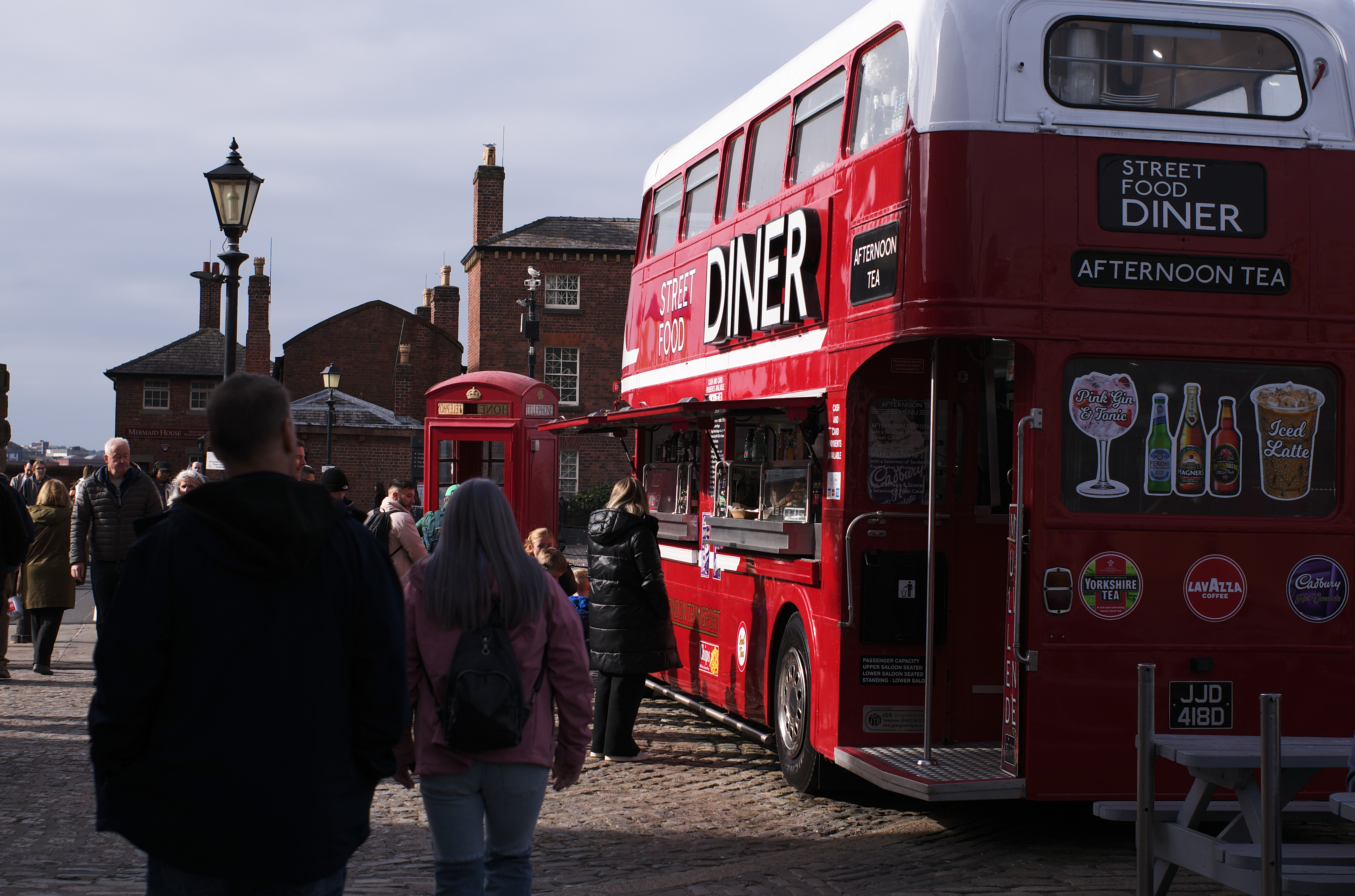A red London bus converted into a diner
