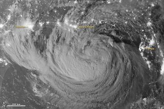 This photo from NASA's Suomi-NPP satellite from Aug. 28, 2012, shows then-Tropical Storm Isaac at night as it approached to U.S. Gulf Coast. City lights of Houston, Texas, New Orleans, La., and Tampa, Fla.m, are noted in this zoom view.