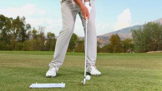 How to swing a golf club - impact