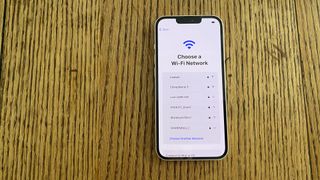 set up your wif-fi network to transfer data an apps to your iPhone 13