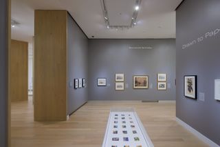 gallery with grey walls inside the Arkansas Museum of Fine Arts by Studio Gang