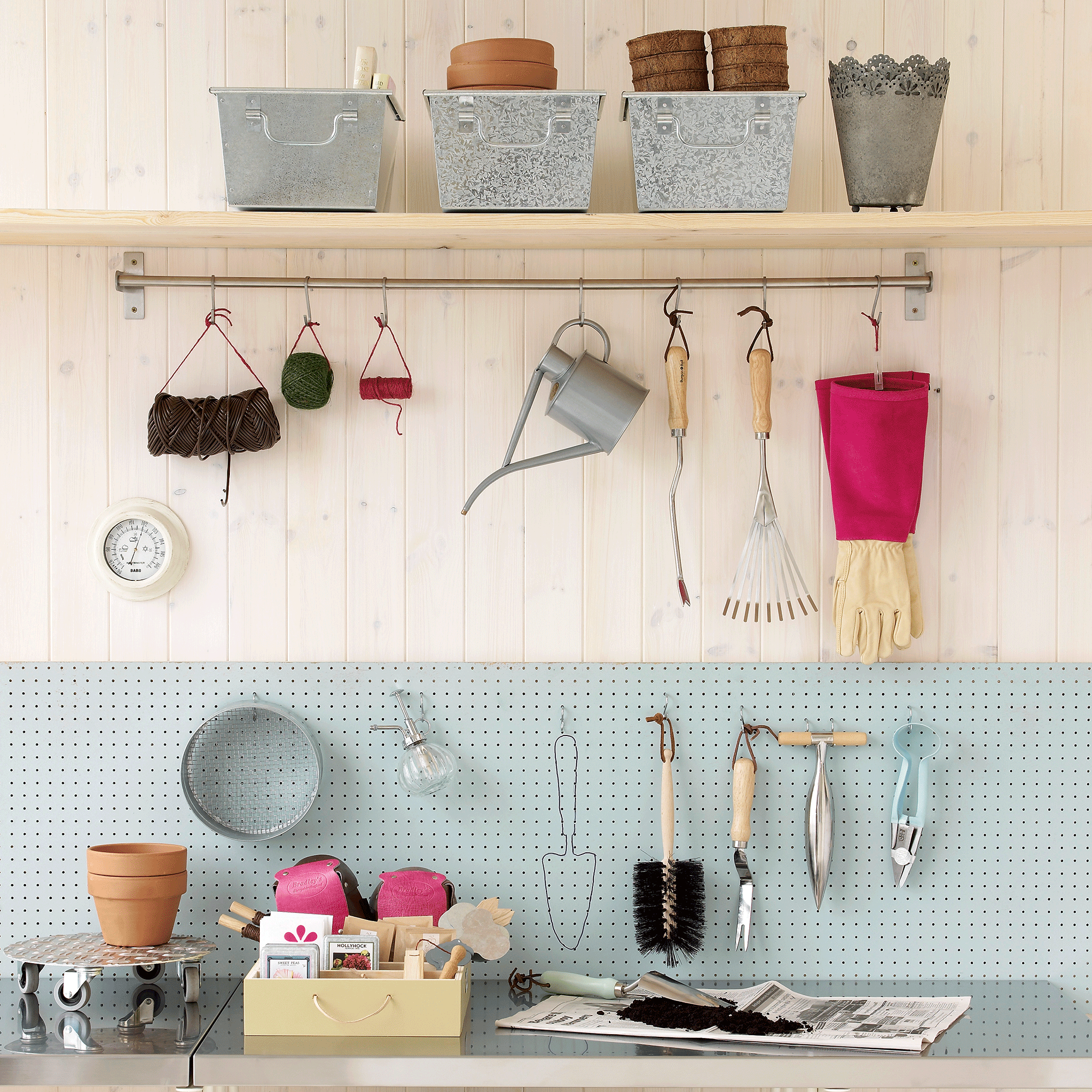 Potting bench with tools hanging on wall