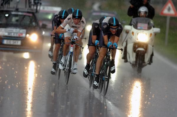 Team Sky battles through heavy rain.