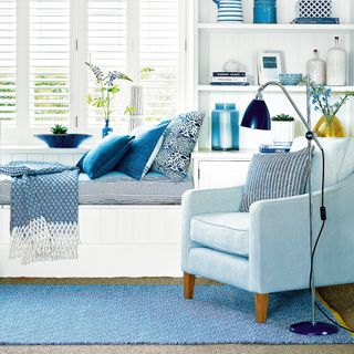 blue soft furnishings in living room