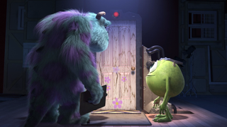 Sully and Mike next to Boo's door at the end of Monsters Inc