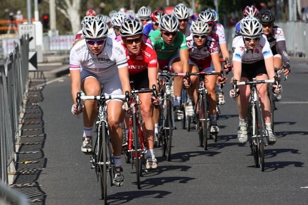 The bunch prepares to turn back into Lygon Street.