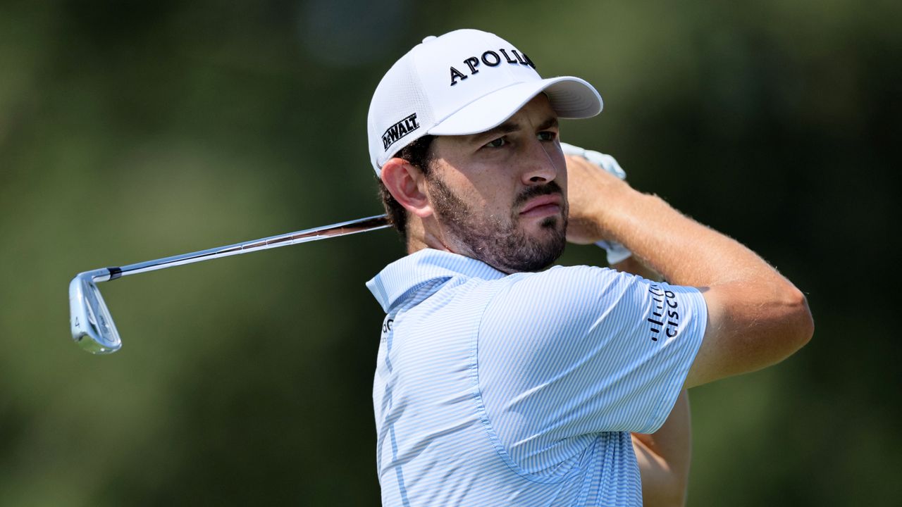 Patrick Cantlay hits an iron shot