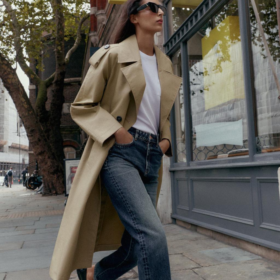 A model wears a ZARA trench coat