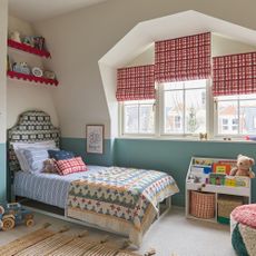 childrens bedroom with red check blinds