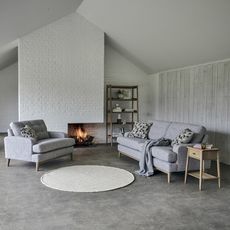 living room with fireplace and sofaset with cushions