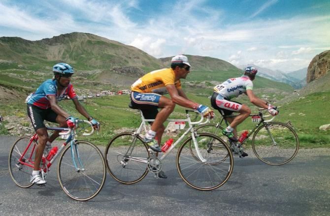 Miguel Indurain (Banesto) front and center in yellow during stage 11 of the 1993 Tour. Tony Rominger, right, would win the stage, Indurain would win overall for the third straight year, and Alvaro Mejia, left, would have his best overall Tour finish with 4th place