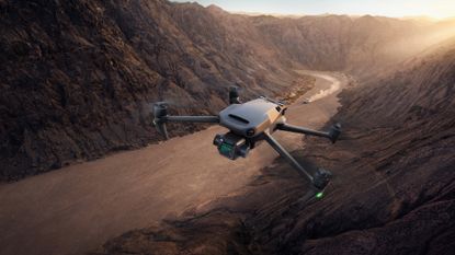 DJI Mavic 3 review: Mavic 3 flying over a canyon
