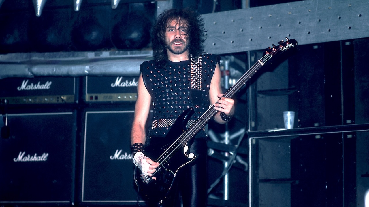 British heavy metal group Judas Priest perform onstage at the Rosemont Horizon, Rosemont, Illinois, June 14, 1984. Pictured is bassist Ian Hill.