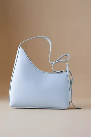 By Anthropologie Asymmetrical Buckle Shoulder Bag