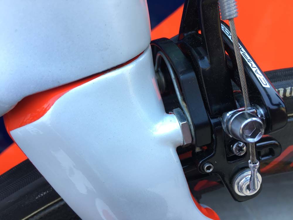 Campagnolo brakes tucked inside the fork for maximum aerodynamics