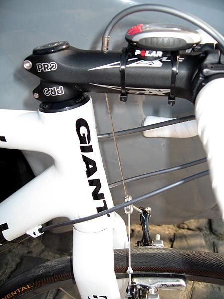 Mechanics carefully drill through the steam to fit cantilever brakes for extra clearance.